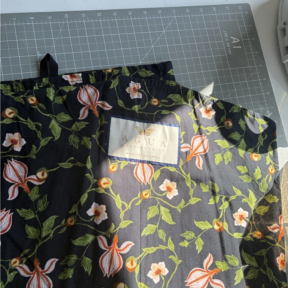 Agua by Agua Bendita black floral garment bag
